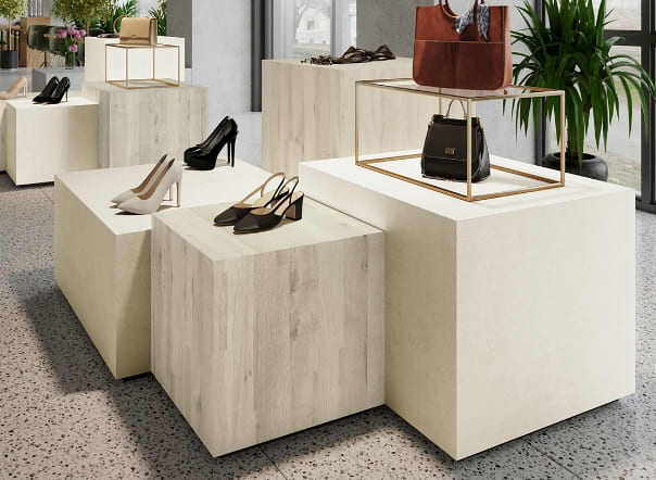 オフホワイトのモルタル調化粧板を使ったカウンター什器イメージ